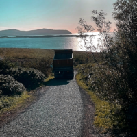 Surface Dressing private roads in Skye at sunset Road Resurfacing Work in Scotland, Highlands & Islands