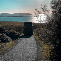 Surface Dressing private roads in Skye at sunset Road Resurfacing Work in Scotland, Highlands & Islands
